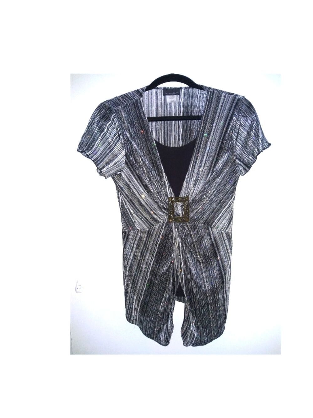 Dressy form-fitting top with sparkles.  Size M